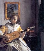 Youg woman playing a guitar Johannes Vermeer